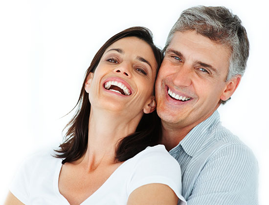 Smiling Couple with porcelain ceramic crowns